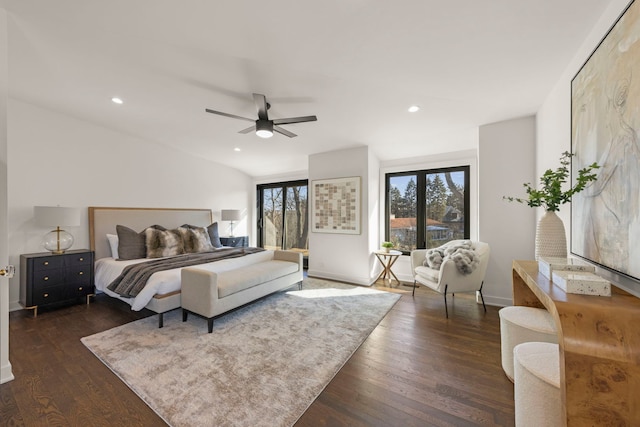 bedroom with dark wood finished floors, ceiling fan, recessed lighting, and baseboards
