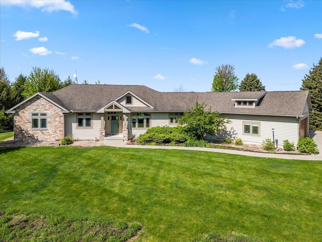 2297 Deer Ridge Ct, Carlock, IL 61725 - view of front of property featuring a front lawn, stone siding, and roof with shingles