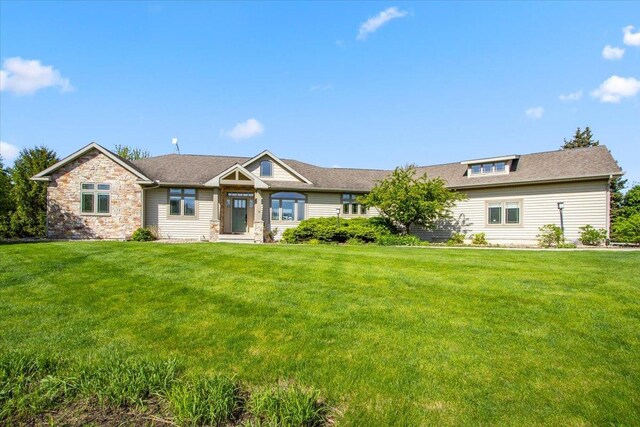 2297 Deer Ridge Ct, Carlock, IL 61725 - view of front of property with a front lawn and roof with shingles