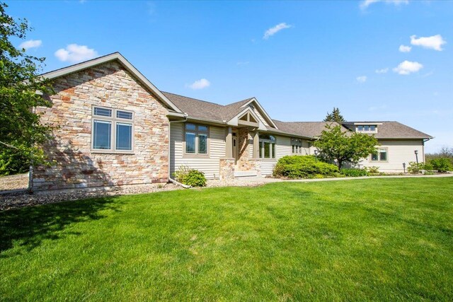 2297 Deer Ridge Ct, Carlock, IL 61725 - view of front of home with a front lawn and stone siding