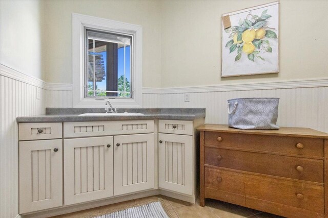 2297 Deer Ridge Ct, Carlock, IL 61725 - bathroom with wainscoting, tile patterned flooring, and vanity