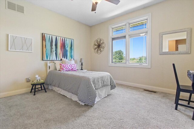 2297 Deer Ridge Ct, Carlock, IL 61725 - carpeted bedroom with baseboards and a ceiling fan