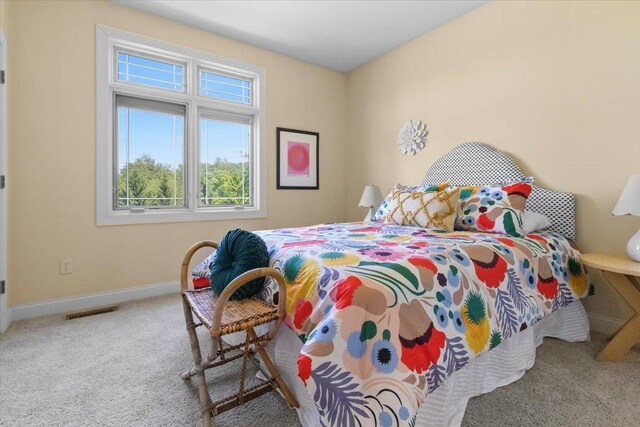 2297 Deer Ridge Ct, Carlock, IL 61725 - bedroom featuring multiple windows, carpet, and baseboards