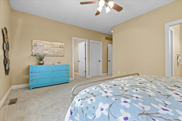 2297 Deer Ridge Ct, Carlock, IL 61725 - carpeted bedroom featuring baseboards and a ceiling fan
