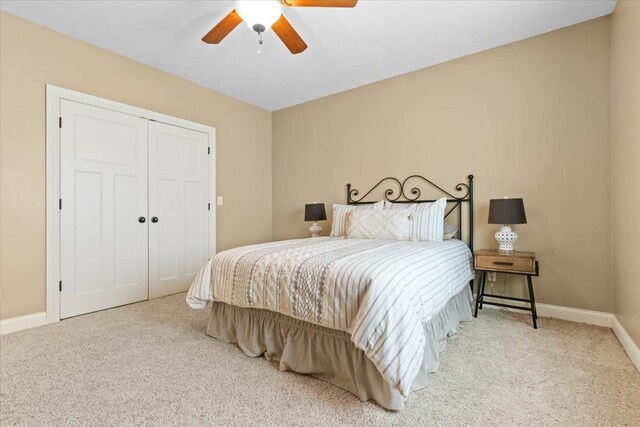 2297 Deer Ridge Ct, Carlock, IL 61725 - bedroom featuring carpet flooring, baseboards, a closet, and a ceiling fan