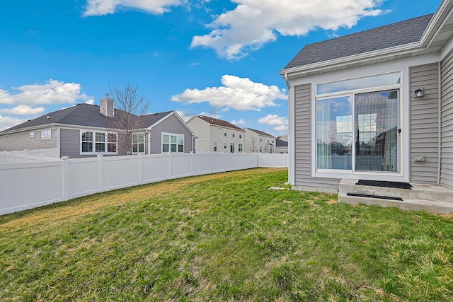 view of yard with a residential view
