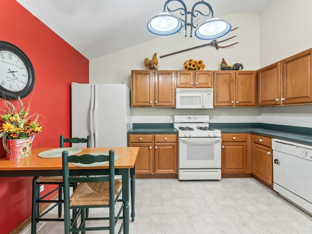 kitchen featuring white appliances, brown cabinets, high vaulted ceiling, a chandelier, and dark countertops