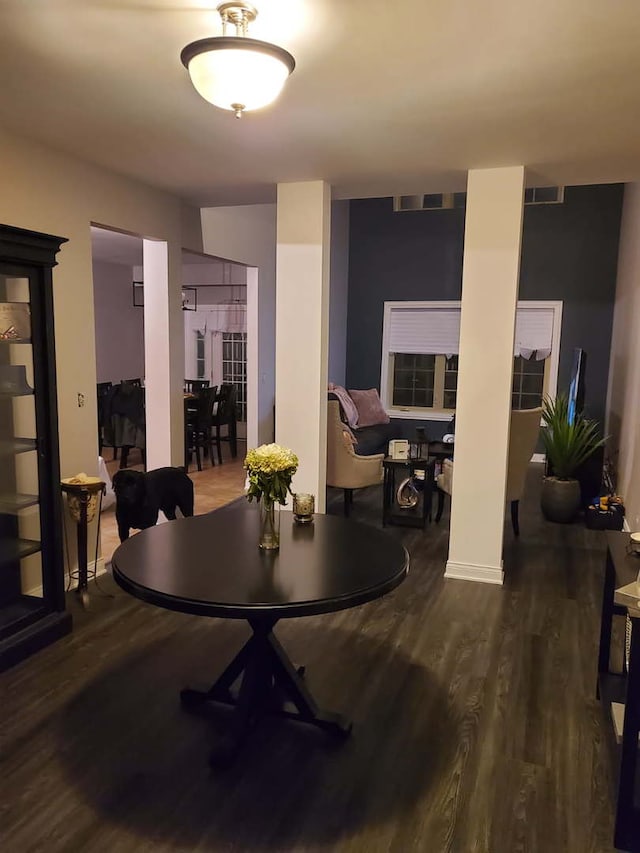 dining room with wood finished floors