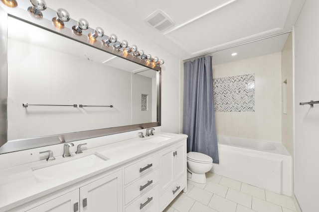 full bathroom featuring tile patterned floors, toilet, double vanity, and shower / bath combo