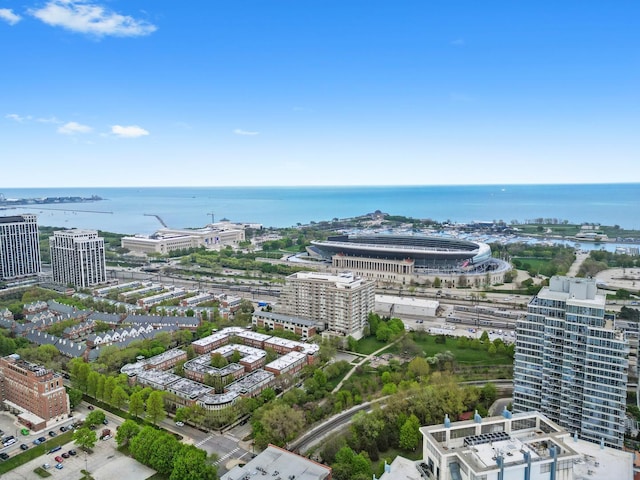 view of urban area with a large body of water