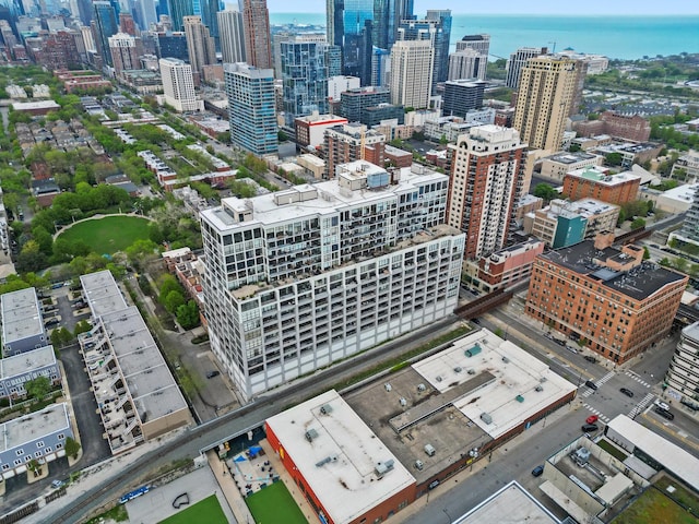 view of urban area featuring a nearby body of water