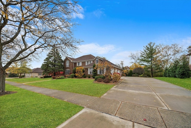 631 Indian Trail Dr, Palos Park, IL 60464 - traditional-style home featuring concrete driveway, a front lawn, a garage, and brick siding