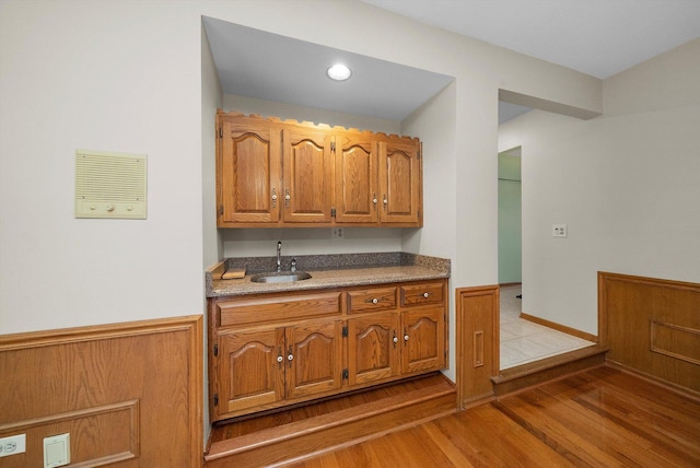 631 Indian Trail Dr, Palos Park, IL 60464 - kitchen with a sink, light wood-style flooring, and brown cabinets