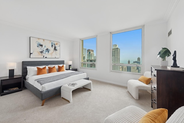 bedroom with crown molding, carpet flooring, a view of city, and baseboards