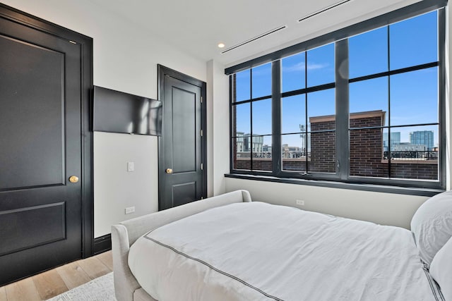 1109 W Washington Blvd Unit 5C, Chicago, IL 60607 - bedroom featuring wood finished floors and recessed lighting