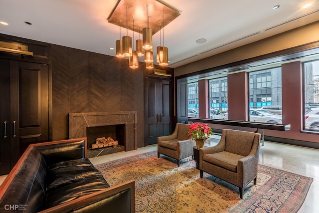 1109 W Washington Blvd Unit 5C, Chicago, IL 60607 - living room featuring a chandelier, a high end fireplace, and recessed lighting