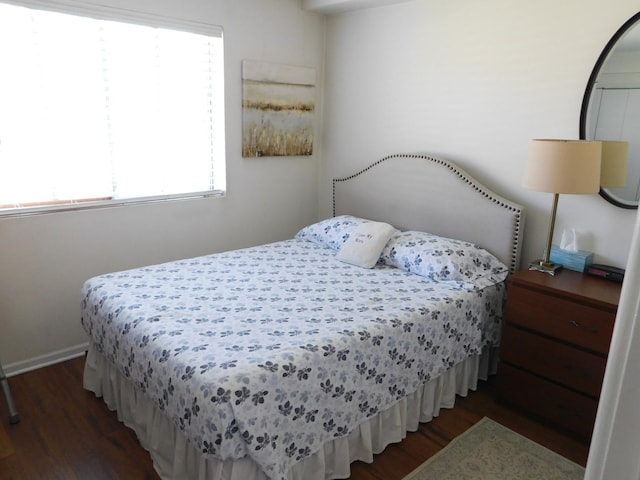 17242 71st Ct Unit 4, Tinley Park, IL 60477 - bedroom featuring wood finished floors, multiple windows, and baseboards