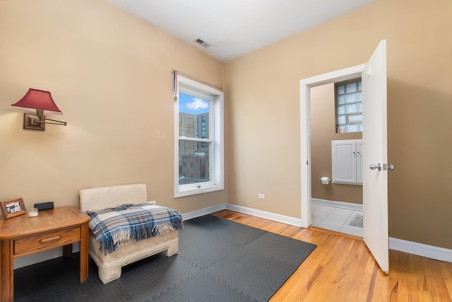 908 W Lakeside Pl Unit 3W, Chicago, IL 60640 - bedroom with hardwood / wood-style floors, baseboards, and multiple windows