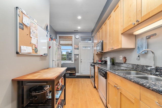 908 W Lakeside Pl Unit 3W, Chicago, IL 60640 - kitchen featuring appliances with stainless steel finishes, a sink, recessed lighting, light wood-style flooring, and light brown cabinetry
