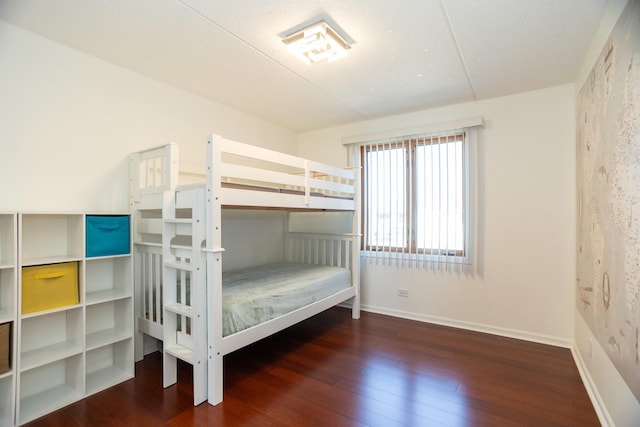 8560 W Foster Ave Unit 209, Norridge, IL 60706 - unfurnished bedroom with hardwood / wood-style floors and baseboards