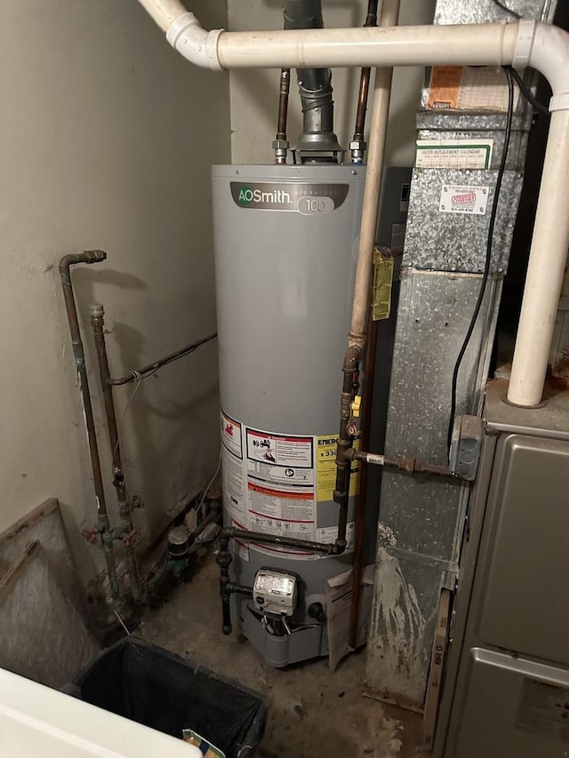 utilities with gas water heater and heating unit