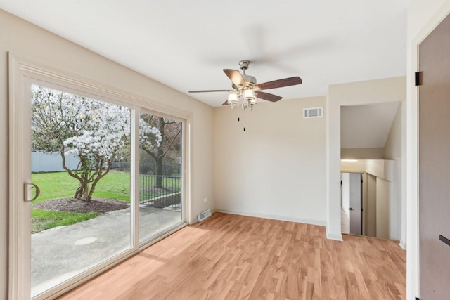 6709 W Menominee Pkwy, Palos Heights, IL 60463 - unfurnished room featuring light wood finished floors, a ceiling fan, and baseboards