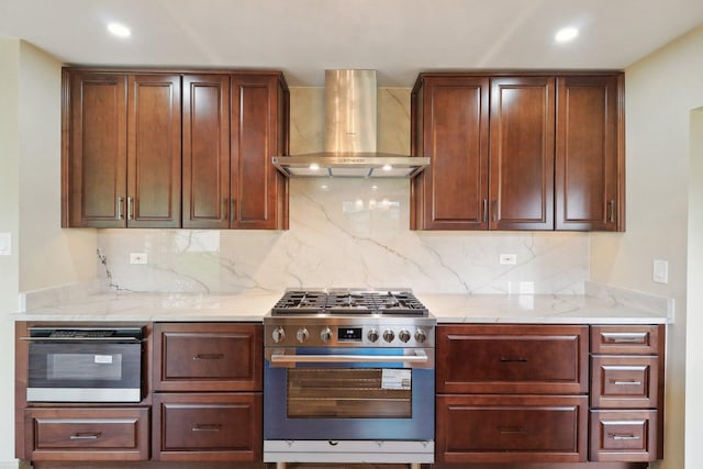 6709 W Menominee Pkwy, Palos Heights, IL 60463 - kitchen featuring stainless steel gas stove, wall chimney range hood, backsplash, oven, and light stone counters