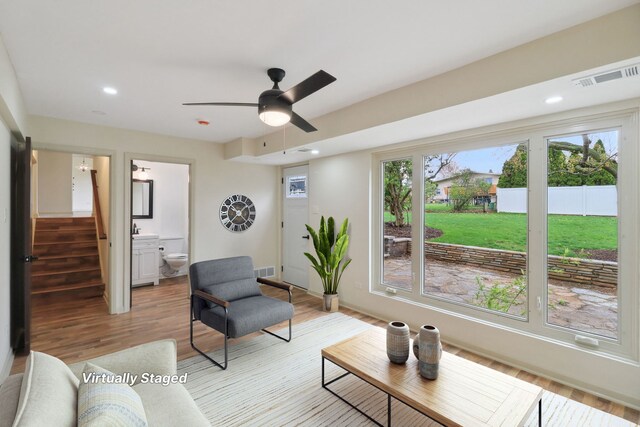 6709 W Menominee Pkwy, Palos Heights, IL 60463 - sitting room featuring stairway, light wood finished floors, ceiling fan, and recessed lighting