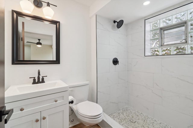6709 W Menominee Pkwy, Palos Heights, IL 60463 - bathroom featuring tiled shower, vanity, toilet, and recessed lighting