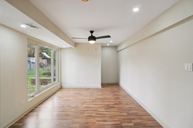 6709 W Menominee Pkwy, Palos Heights, IL 60463 - unfurnished room with light wood-type flooring, recessed lighting, baseboards, and ceiling fan