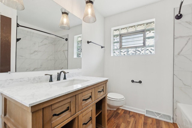 6709 W Menominee Pkwy, Palos Heights, IL 60463 - full bathroom with plenty of natural light, toilet, wood finished floors, and vanity