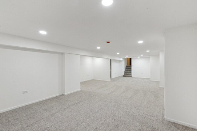 6709 W Menominee Pkwy, Palos Heights, IL 60463 - finished below grade area with light colored carpet, recessed lighting, stairway, and baseboards