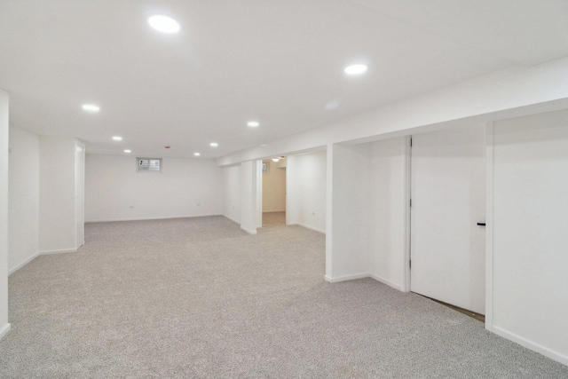 6709 W Menominee Pkwy, Palos Heights, IL 60463 - finished below grade area with recessed lighting, light carpet, and baseboards