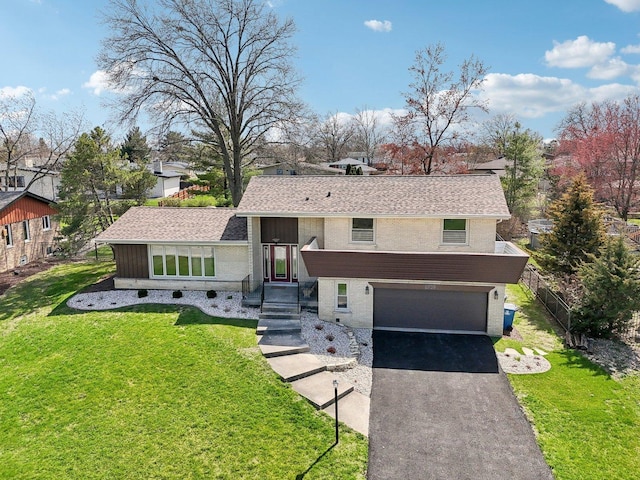 6709 W Menominee Pkwy, Palos Heights, IL 60463 - view of front facade with an attached garage, asphalt driveway, brick siding, and a shingled roof