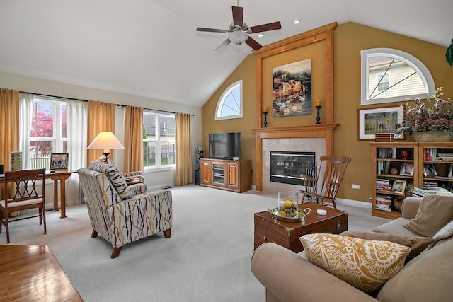 318 Maple St, Beecher, IL 60401 - living room with a tiled fireplace, a ceiling fan, and high vaulted ceiling