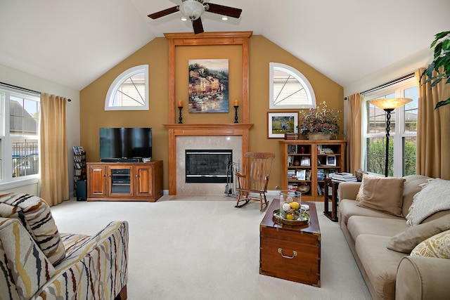 318 Maple St, Beecher, IL 60401 - living room featuring ceiling fan, a tile fireplace, high vaulted ceiling, and carpet flooring