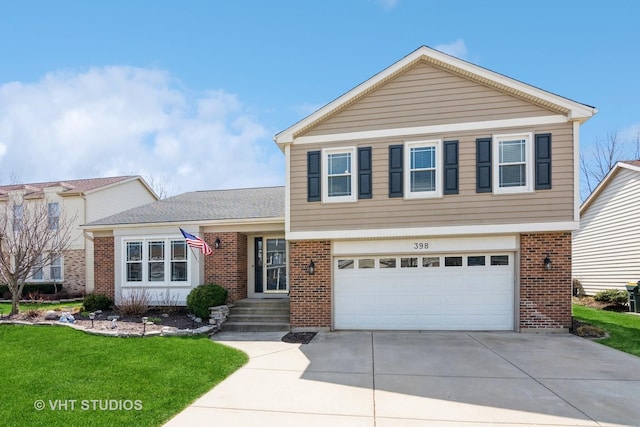 398 Stonewood Cir, Carol Stream, IL 60188 - split level home featuring concrete driveway, brick siding, an attached garage, and a front yard