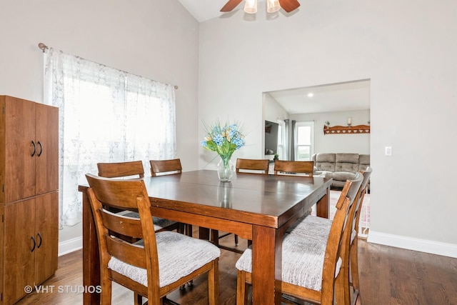 398 Stonewood Cir, Carol Stream, IL 60188 - dining area featuring wood finished floors, baseboards, a ceiling fan, and lofted ceiling