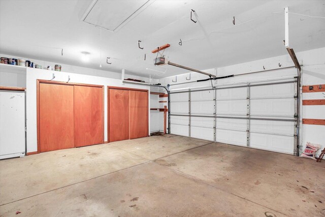 3112 Valerie Dr, Champaign, IL 61822 - garage featuring a garage door opener