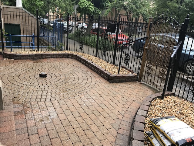 1842 N Paulina St, Chicago, IL 60622 - view of patio featuring fence and a gate