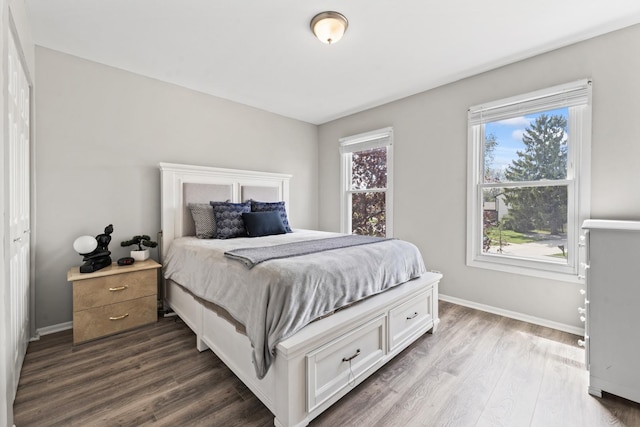 413 Caren Dr, Buffalo Grove, IL 60089 - bedroom with dark wood-type flooring and baseboards