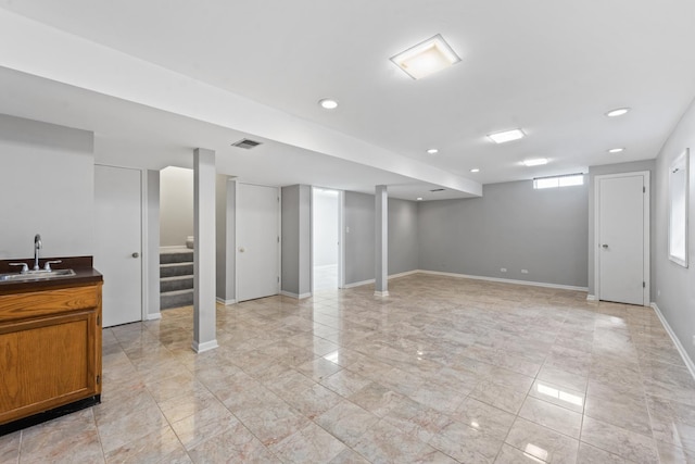 413 Caren Dr, Buffalo Grove, IL 60089 - below grade area featuring a sink, stairs, baseboards, and recessed lighting