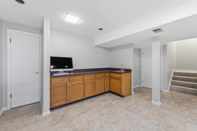 413 Caren Dr, Buffalo Grove, IL 60089 - indoor wet bar featuring stairs and baseboards