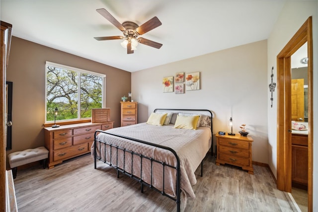 1468 W Remington Ln, Round Lake, IL 60073 - bedroom featuring light wood finished floors and a ceiling fan