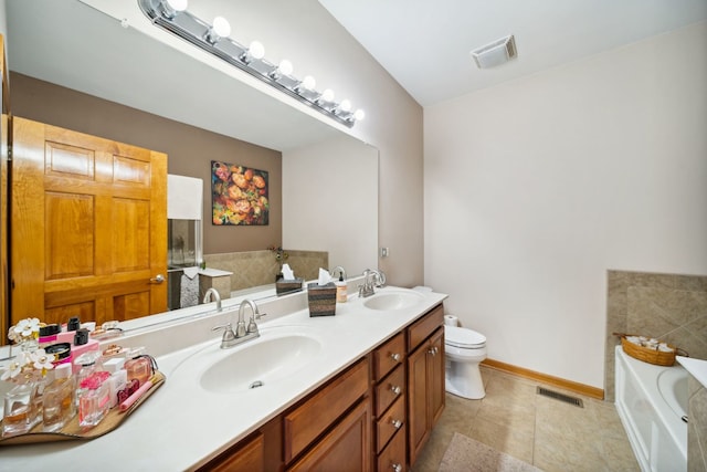1468 W Remington Ln, Round Lake, IL 60073 - full bathroom with a bath, double vanity, baseboards, toilet, and tile patterned flooring