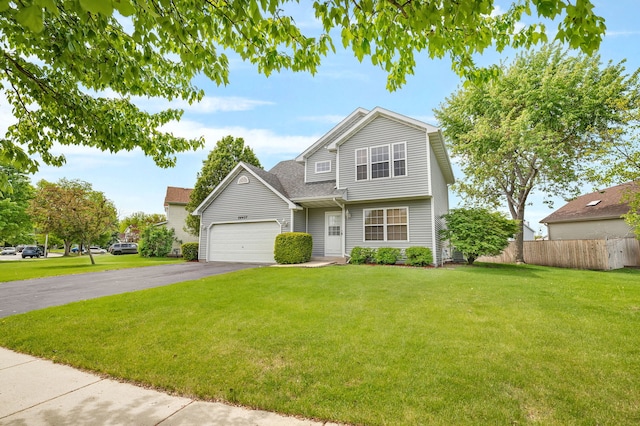 26437 W Deer Path, Channahon, IL 60410 - view of front facade featuring driveway, a garage, and a shingled roof