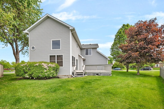 26437 W Deer Path, Channahon, IL 60410 - rear view of property with a deck and a lawn