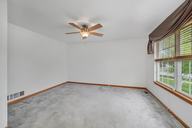 26437 W Deer Path, Channahon, IL 60410 - spare room featuring carpet floors, a ceiling fan, and baseboards