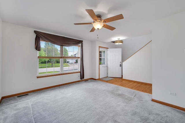 26437 W Deer Path, Channahon, IL 60410 - carpeted spare room with baseboards and ceiling fan