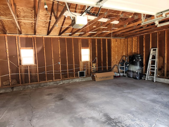 garage featuring a garage door opener